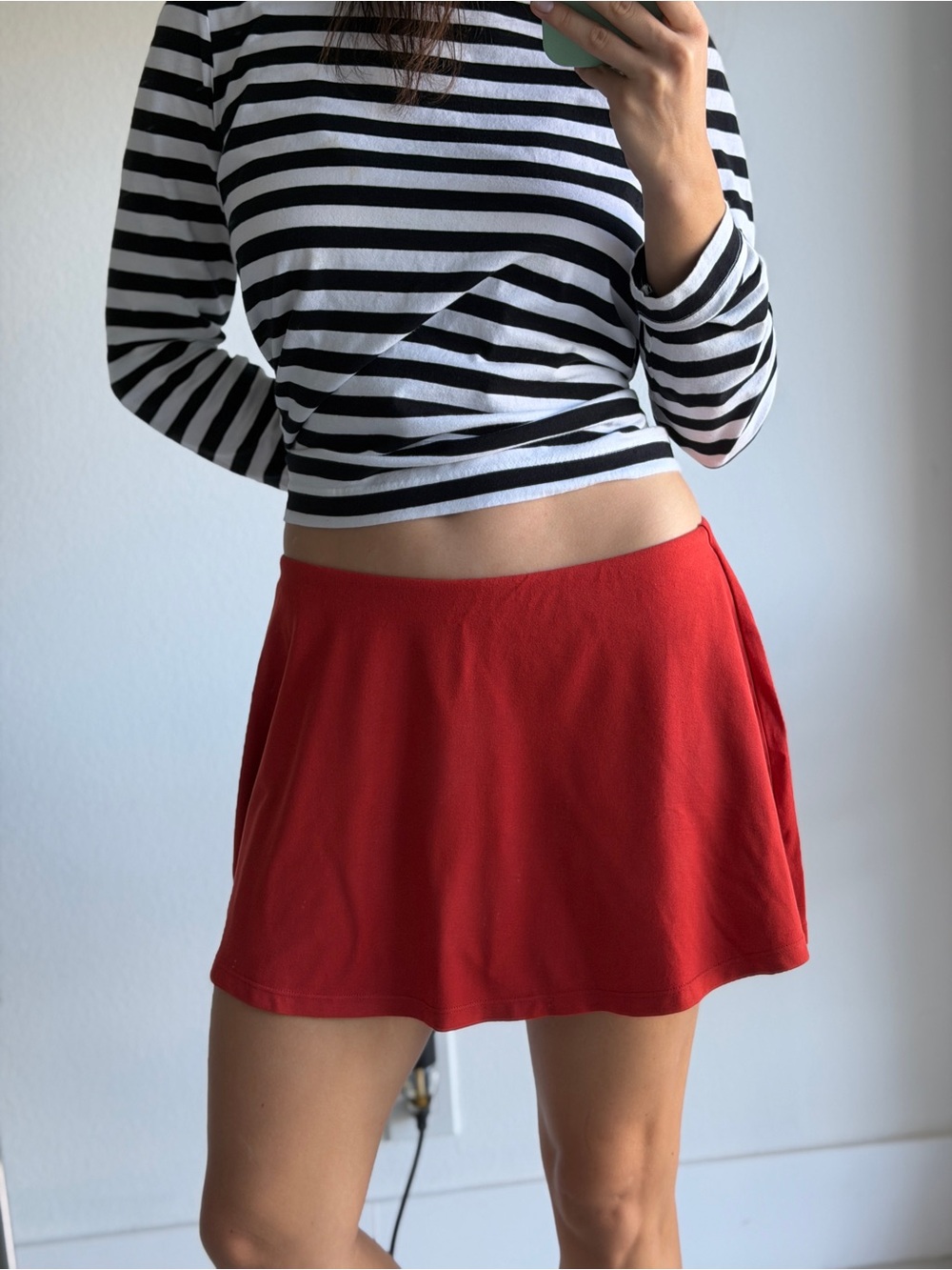 Skims red skirt with shorts